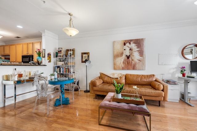 living room with recessed lighting, light wood-type flooring, baseboards, and ornamental molding