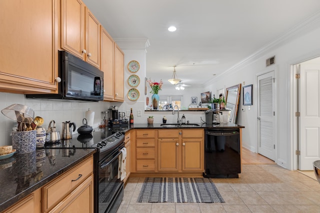 kitchen featuring crown molding, decorative backsplash, a peninsula, black appliances, and a sink