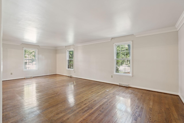 810 Creekside Dr, Mount Pleasant, SC 29464 - spare room featuring visible vents, wood finished floors, and a healthy amount of sunlight