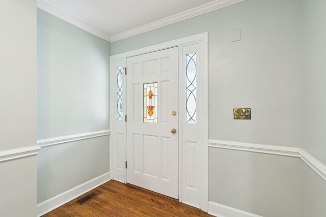 entryway featuring baseboards, dark wood-style flooring, visible vents, and crown molding