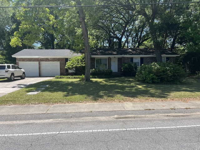 1866 Ashley Hall Rd, Charleston, SC 29407 - ranch-style house with driveway, a garage, brick siding, and a front lawn