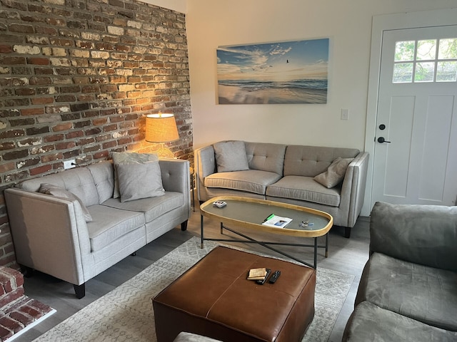 1866 Ashley Hall Rd, Charleston, SC 29407 - living area with wood finished floors and brick wall