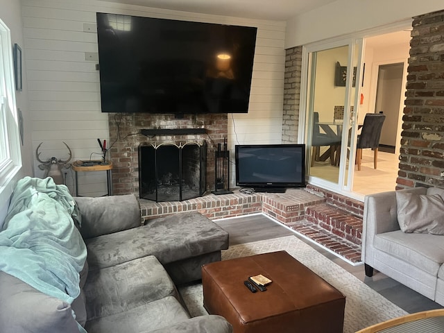 1866 Ashley Hall Rd, Charleston, SC 29407 - living room with wood finished floors, a fireplace, and wood walls
