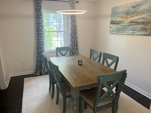 1866 Ashley Hall Rd, Charleston, SC 29407 - dining space featuring baseboards and wood finished floors