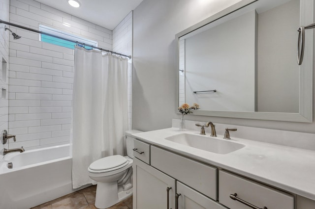 bathroom featuring shower / tub combo, tile patterned flooring, vanity, and toilet