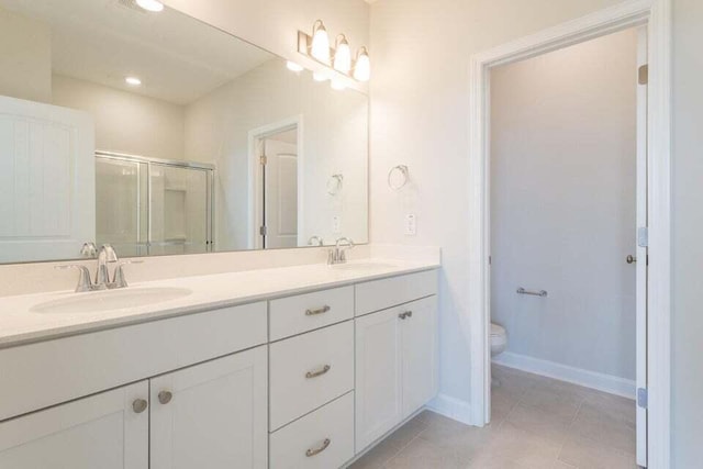 125 Brown Swiss Cir, Summerville, SC 29483 - bathroom featuring a sink, double vanity, toilet, and a stall shower