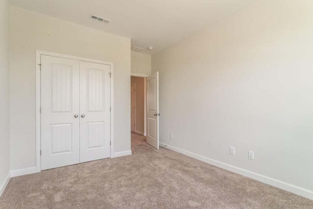 125 Brown Swiss Cir, Summerville, SC 29483 - unfurnished bedroom with carpet flooring, a closet, visible vents, and baseboards