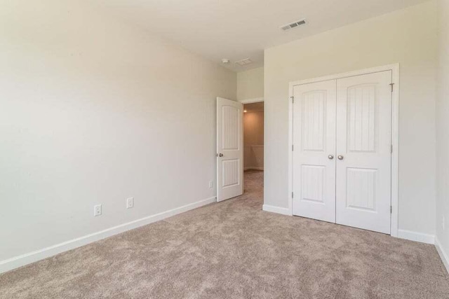 125 Brown Swiss Cir, Summerville, SC 29483 - unfurnished bedroom featuring carpet, visible vents, baseboards, and a closet