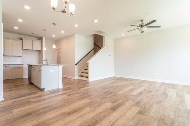 125 Brown Swiss Cir, Summerville, SC 29483 - kitchen featuring ceiling fan with notable chandelier, decorative light fixtures, recessed lighting, light wood-style flooring, and open floor plan
