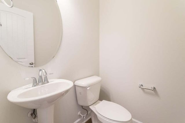 125 Brown Swiss Cir, Summerville, SC 29483 - half bath with a sink, toilet, and baseboards