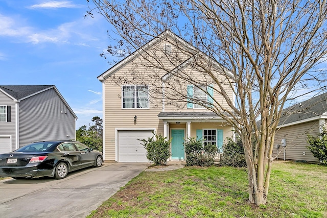 traditional-style home with an attached garage, driveway, and a front yard