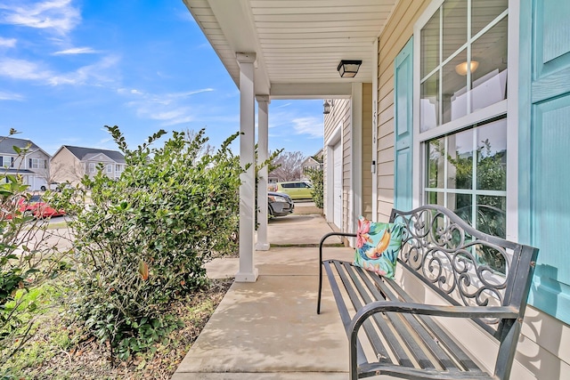 view of patio with a porch and a residential view