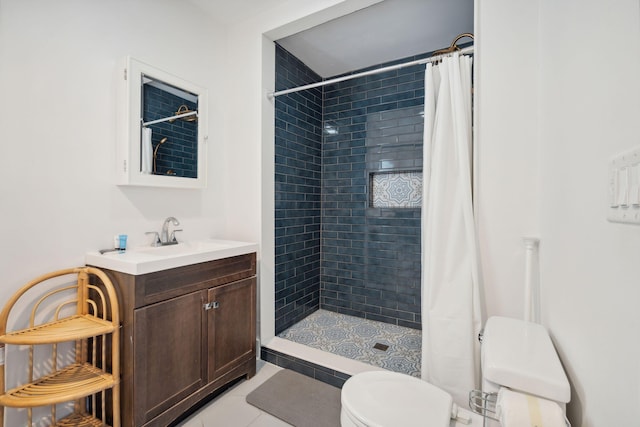 167 Coming St, Charleston, SC 29403 - full bath with toilet, vanity, tiled shower, and tile patterned flooring