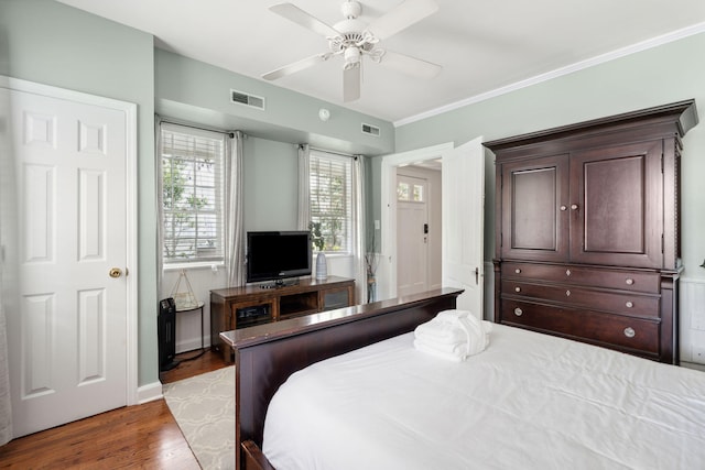 167 Coming St, Charleston, SC 29403 - bedroom with wood finished floors, ceiling fan, baseboards, and ornamental molding