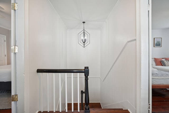 167 Coming St, Charleston, SC 29403 - staircase featuring ornamental molding, wood finished floors, and a decorative wall