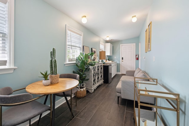 bedroom featuring visible vents, baseboards, ceiling fan, and wood finished floors