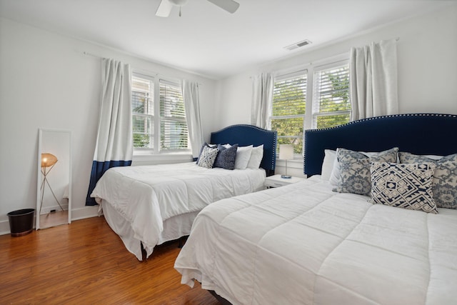 167 Coming St, Charleston, SC 29403 - bedroom featuring wood finished floors and ceiling fan