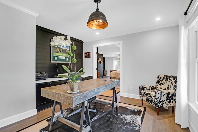 home office with ornamental molding, recessed lighting, wood finished floors, and baseboards