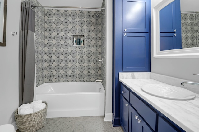 bathroom with shower / bath combination with curtain and vanity