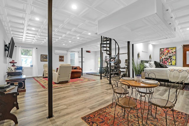 dining room with a wall unit AC, an ornate ceiling, and baseboards