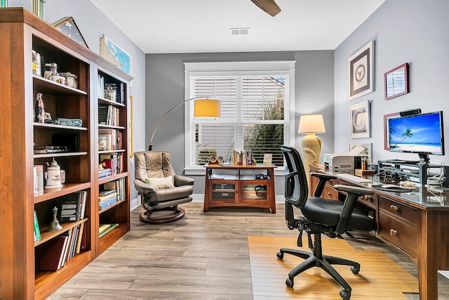 home office featuring light hardwood / wood-style floors