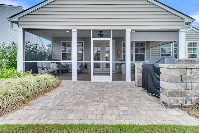 back of property featuring a patio area and french doors