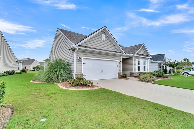 view of front of property with a garage and a front yard