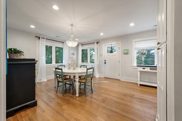 dining area with recessed lighting, baseboards, and light wood-style flooring