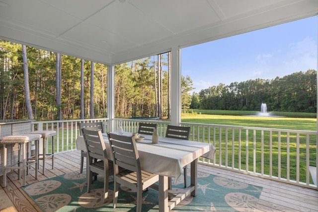 1130 Plantation Overlook Dr, Moncks Corner, SC 29461 - wooden terrace featuring outdoor dining area, a yard, and a water view