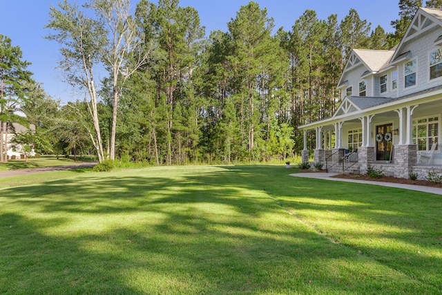 1130 Plantation Overlook Dr, Moncks Corner, SC 29461 - view of green lawn featuring a porch