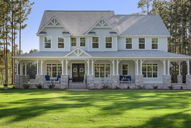 1130 Plantation Overlook Dr, Moncks Corner, SC 29461 - view of front facade with covered porch, roof with shingles, and a front yard