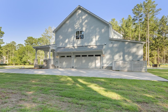 1130 Plantation Overlook Dr, Moncks Corner, SC 29461 - view of property exterior featuring a garage, a yard, and concrete driveway