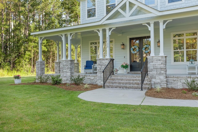 1130 Plantation Overlook Dr, Moncks Corner, SC 29461 - doorway to property with covered porch and a lawn