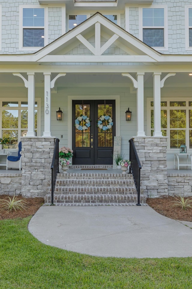 1130 Plantation Overlook Dr, Moncks Corner, SC 29461 - property entrance with a porch and french doors