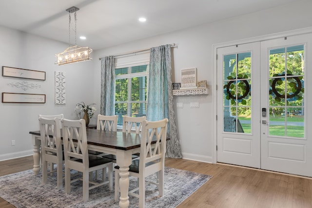 1130 Plantation Overlook Dr, Moncks Corner, SC 29461 - dining room with french doors, plenty of natural light, wood finished floors, and recessed lighting