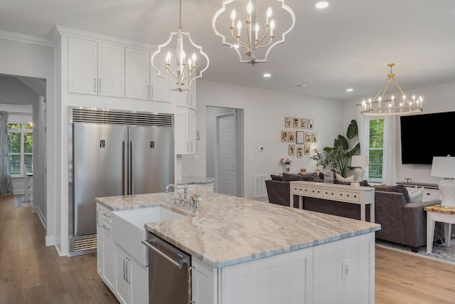 1130 Plantation Overlook Dr, Moncks Corner, SC 29461 - kitchen with a chandelier, stainless steel appliances, open floor plan, healthy amount of natural light, and recessed lighting
