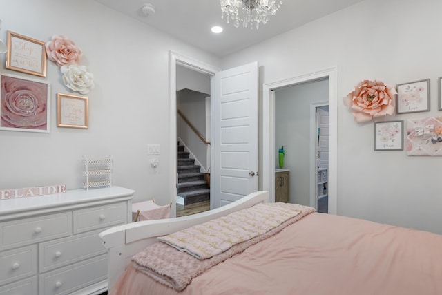 1130 Plantation Overlook Dr, Moncks Corner, SC 29461 - bedroom with a chandelier