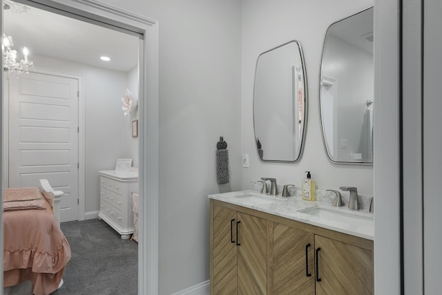 1130 Plantation Overlook Dr, Moncks Corner, SC 29461 - bathroom with double vanity and baseboards