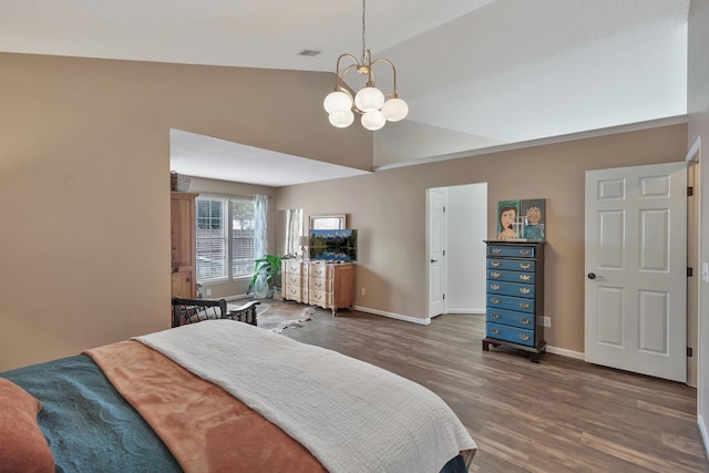 bedroom featuring lofted ceiling, baseboards, a notable chandelier, and wood finished floors