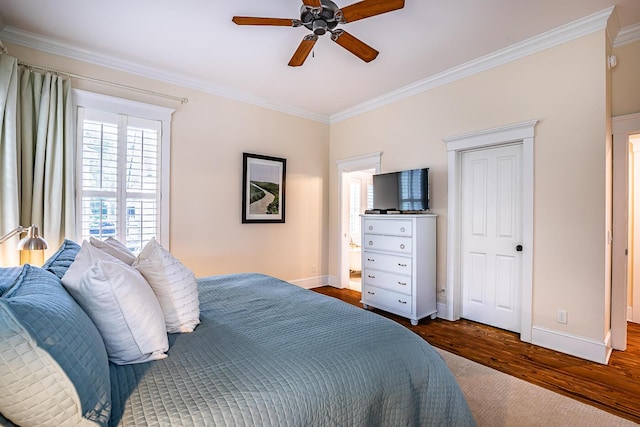 bedroom featuring ceiling fan, crown molding, and dark hardwood / wood-style floors