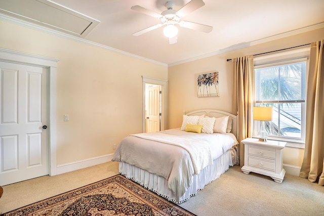 carpeted bedroom featuring ceiling fan and ornamental molding