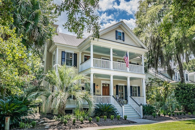 view of front of property with covered porch and a balcony