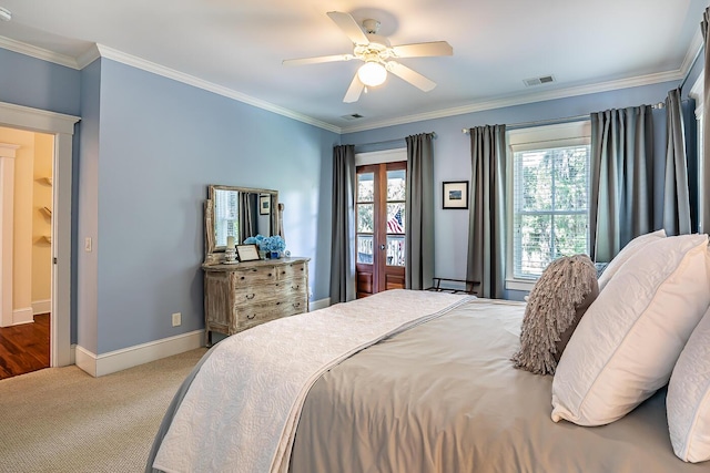 carpeted bedroom featuring ceiling fan, french doors, and crown molding