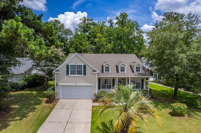 view of front of house featuring a front yard and a garage