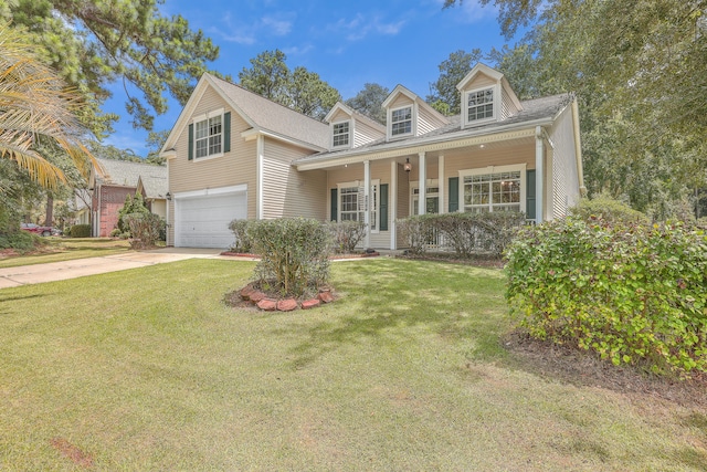 new england style home featuring a front lawn, a porch, and a garage