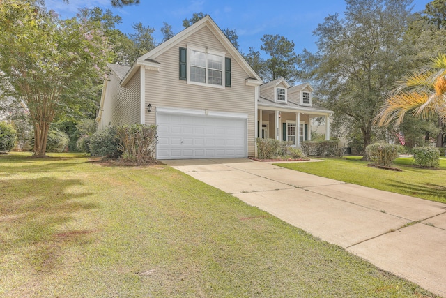 view of front of property with covered porch, a garage, and a front yard