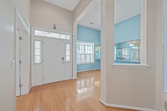 foyer with light hardwood / wood-style flooring