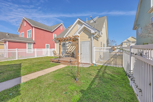 view of front facade featuring a fenced backyard, a pergola, a shingled roof, a front lawn, and a deck