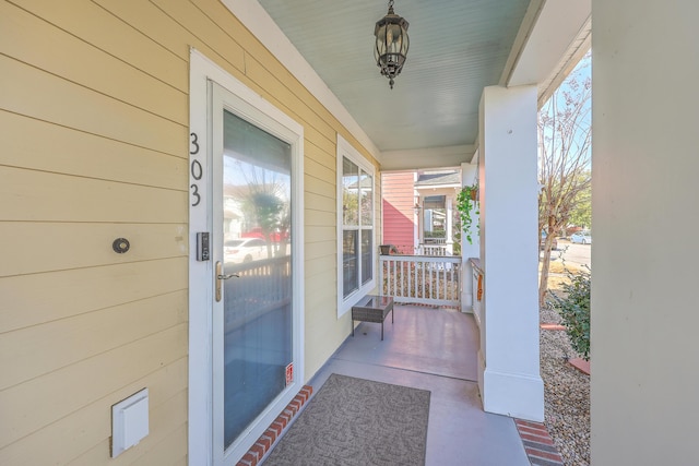 doorway to property with covered porch