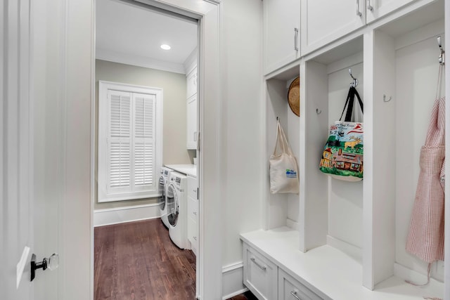 mudroom featuring dark hardwood / wood-style flooring, independent washer and dryer, and ornamental molding